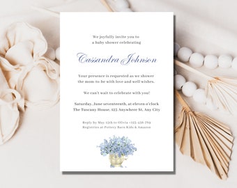 May include: A baby shower invitation with elegant script and floral accents. The invitation reads "We joyfully invite you to a baby shower celebrating Cassandra Johnson." Details include date, time, and location.