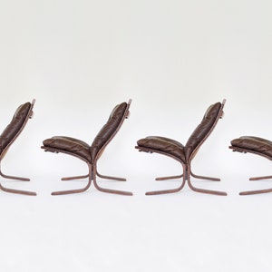 Vintage Peanut Brown Leather Plywood Siesta Chair Ingmar Relling Westnofa Denmark 1970s set of 4 Scandinavian Mid Century Modern Furniture