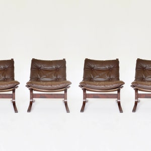 Vintage Peanut Brown Leather Plywood Siesta Chair Ingmar Relling Westnofa Denmark 1970s set of 4 Scandinavian Mid Century Modern Furniture