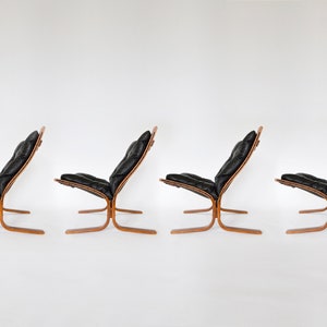 Vintage Black Leather Brown Plywood Siesta Chair Ingmar Relling Westnofa Denmark 1970s set of 4 Scandinavian Mid Century Modern Furniture