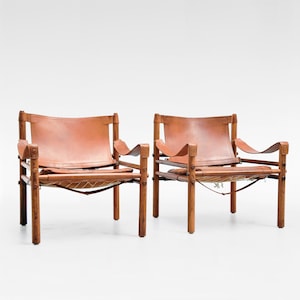 Vintage Cognac Leather Wood Scirocco Safari Lounge Chairs Arne Norell AB 1960s Set of 2 Scandinavian Mid Century Modern Minimal Furniture