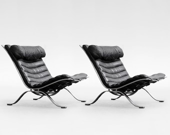 Sillón Ari Sling vintage de acero y cuero negro Arne Norell AB, década de 1960, juego de 2, icono del diseño de muebles modernos escandinavos de mediados de siglo