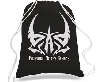 May include: Black drawstring backpack with a white tribal design and the text "Backstage Access Designs". The bag has white drawstrings and is likely made of a durable fabric, suitable for carrying various items.