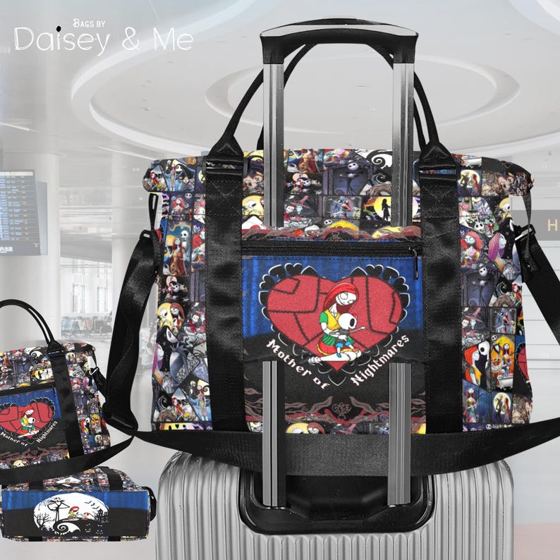 May include: A black tote bag with a colourful collage pattern of characters. The bag features a front pocket with a heart-shaped design and the text "Mother of Nightmares". It has black handles and a shoulder strap.