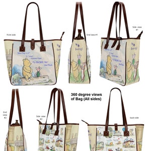 May include: A beige tote bag with brown leather handles and a zipper closure. The bag features a colorful print of Winnie the Pooh and Piglet characters from the book "My Favorite Day" by A.A. Milne. The text "What Day is it? Today!" and "My Favorite Day" is printed on the bag.