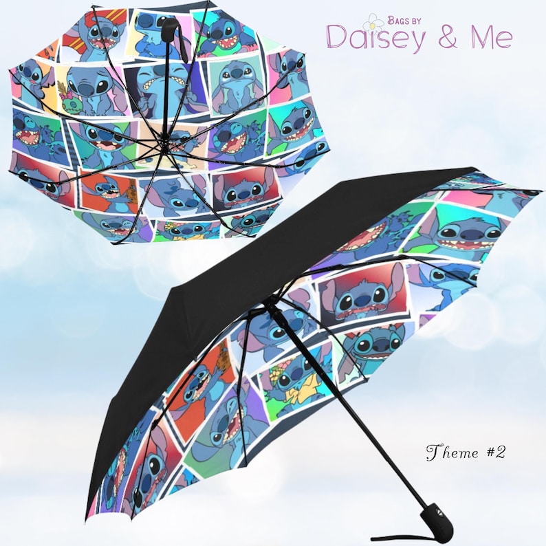 May include: Two open umbrellas with a black exterior and a colourful interior featuring a collage of Stitch from Lilo & Stitch. The umbrellas have a black handle and a metal frame. The text "Bags by Daisey & Me" and "Theme #2" are visible.