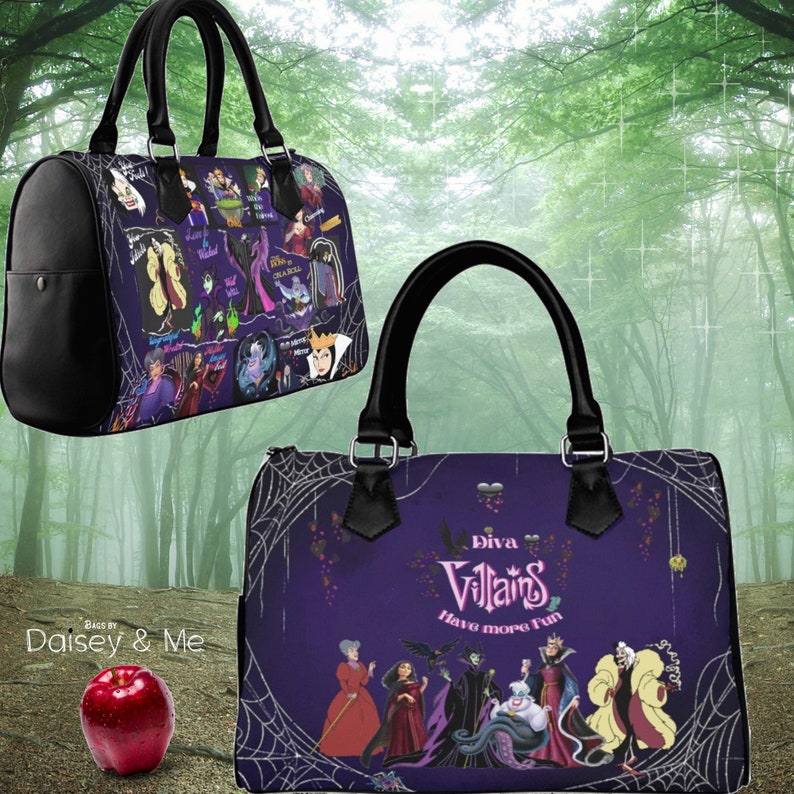 May include: Purple handbag with a black handle and a design of Disney villains. The bag has a spiderweb pattern and the text "Diva Villains Have More Fun".