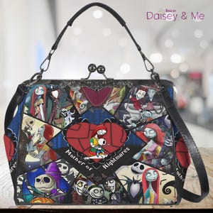 May include: A black handbag with a clasp closure and a shoulder strap. The bag features a patchwork design with various characters and the text "Mother of Nightmares" in a heart-shaped design. The bag has a black handle and silver hardware.