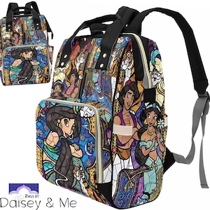 May include: A multi-colored backpack with a stained glass design featuring characters from the Disney movie Aladdin. The backpack has a large main compartment, a smaller front pocket, and two adjustable straps. The design includes Aladdin, Jasmine, Abu, and the Genie.