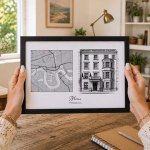Op de afbeelding: Een ingelijste print met een grijze kaart met een rode locatie-indicator aan de linkerkant en een zwart-witte architecturale schets van een gebouw aan de rechterkant, met de tekst Home en 51 Waldridge Close onder de afbeeldingen.
