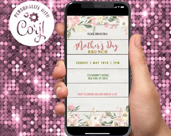 May include: A smartphone displays a Mother's Day Brunch invitation. The design features floral accents, a wooden plank background, and the text "Mother's Day Brunch" in a decorative font. The invitation includes date, time, and RSVP information.