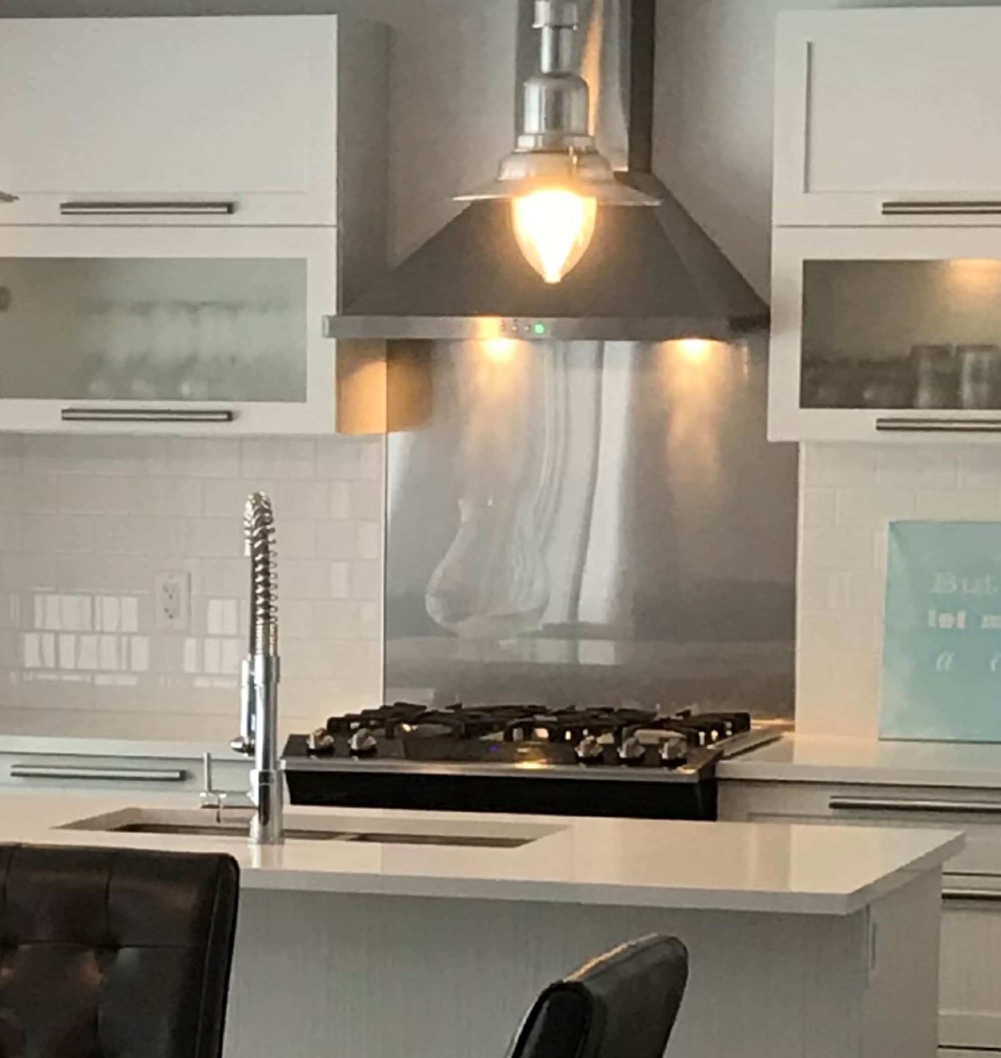 stainless steel sheet behind stove