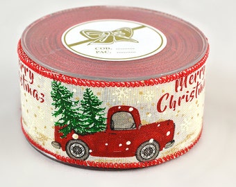May include: A roll of red and white Christmas ribbon with a red truck carrying a Christmas tree and the words "Merry Christmas" printed on it.