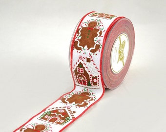 May include: White ribbon with red trim and a repeating pattern of gingerbread men and gingerbread houses. The ribbon is rolled up on a spool.