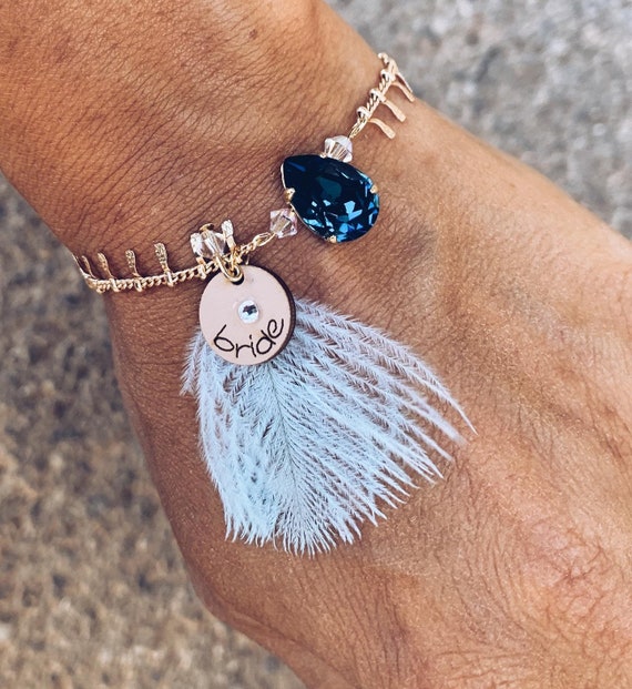 Swarovski on sale bracelet feather