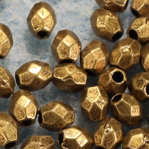 Oval 4mm Faceted Antique Bronze Tone Spacer Beads - 1032