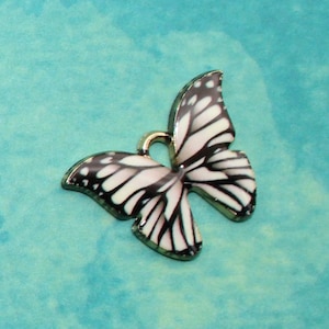 Butterfly 21mm Black White and Pink Enamel With a Gold Plated Finish Single Sided Insect Garden Charms - 0225