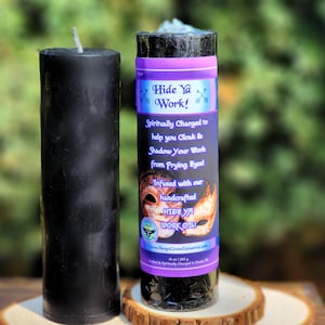 May include: Black candle with a purple label that reads "Hide Ya Work!" Spiritually Charged to help you Cloak & Shadow Your Work from Prying Eyes! Infused with our handcrafted HIDE YA WORK OIL! www.RavynGroveElemental.com 30 oz | 283 g Crafted & Spiritually Charged in Canada.