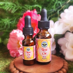 Love Oil - A Handcrafted Sweet & Spicy Conjure Hoodoo Witch Ritual Oil of a special blend of Love Workin herbs n oils!