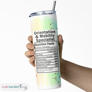 May include: A white tumbler with a colorful ombre design and gold glitter. The tumbler has a nutrition facts label that reads "Orientation & Mobility Specialist" with a list of skills and percentages.
