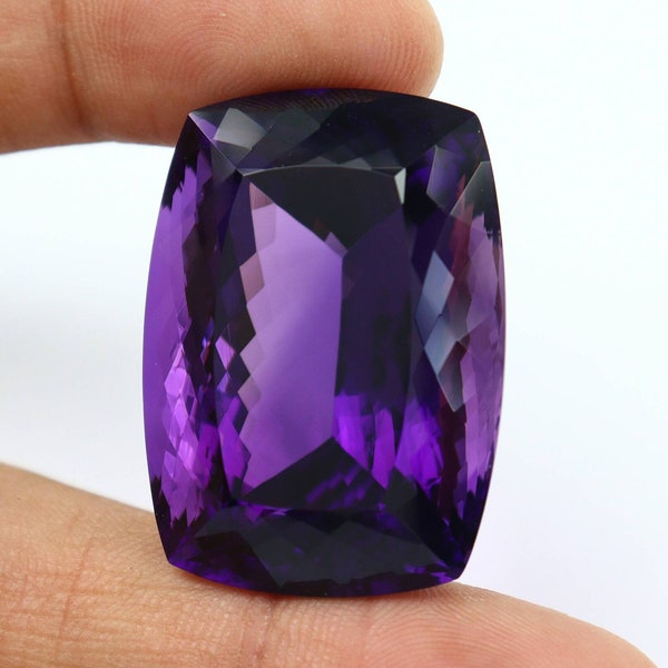 Super fine quality  Natural Antique  Amethyst faceted cushion . Very rare size of 97 carat royal purple AAA color,high quality.Loupe clean