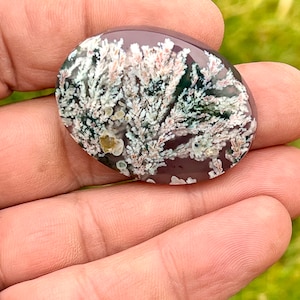 Raw natural plume agate cabochon. 100% natural.