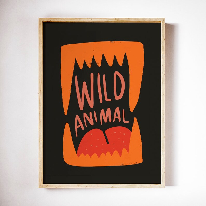 May include: A black and orange poster with the text "WILD ANIMAL" in a stylized font. The text is inside a large orange mouth with sharp teeth.