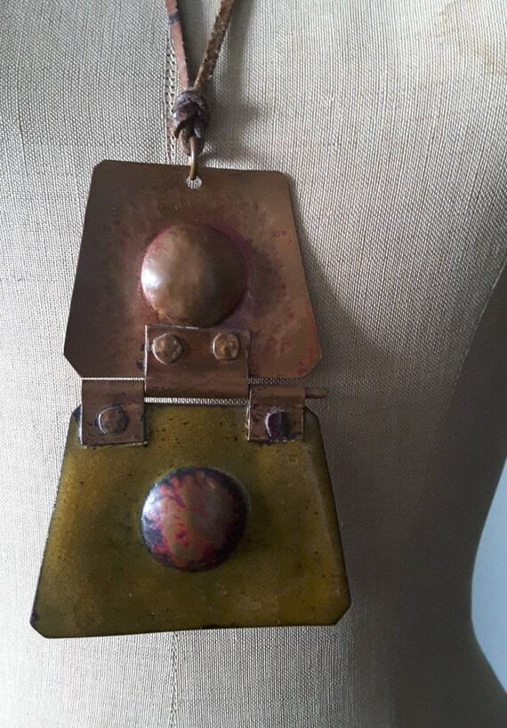Unique crafted metal statement necklace with circl