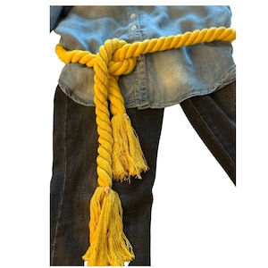 These statement marigold-yellow rope belts are the perfect fashion accessories for 2025! Update classic styles with a splash of fun color.