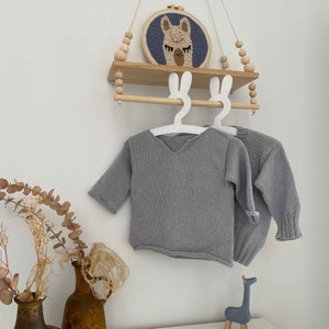 Kai Baby Pullover und Strickjacke