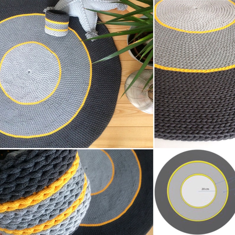 May include: A round, grey and black crocheted rug with a yellow border. The rug has a smaller circle in the centre with a yellow border. The rug is 20 cm in diameter.
