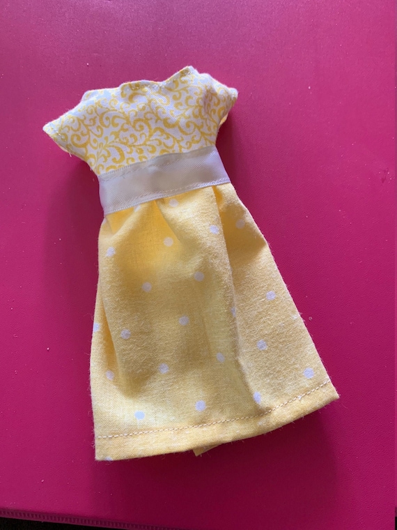 yellow barbie doll