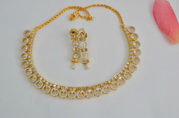Cz necklace sets best sale in gold with price