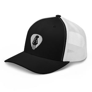 Bassist/Guitarist • Trucker Cap