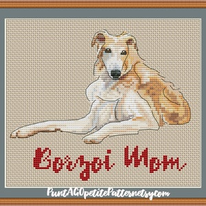 May include: Cross stitch pattern of a light brown Borzoi dog lying down with the text "Borzoi Mom" in red below the dog.