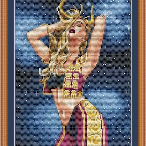May include: A cross-stitch pattern featuring a woman with blonde hair wearing a purple and gold outfit. The woman is posed against a dark blue background with white stars. The pattern includes the text "PuntAGOpetitePatternetsy.com".