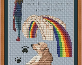 May include: Cross stitch pattern featuring a woman standing next to a rainbow bridge, a dog, and paw prints. The text reads "I loved you your whole life and I'll miss you the rest of mine".