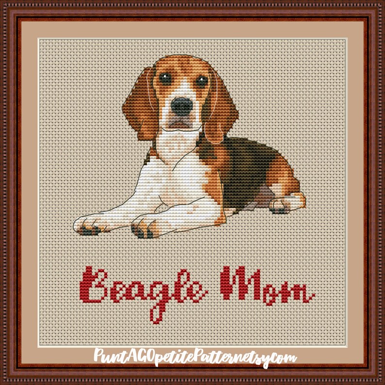May include: Cross stitch pattern of a beagle dog lying down with the text "Beagle Mom" below it.