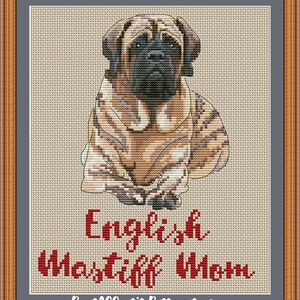 May include: Cross-stitch pattern of an English Mastiff dog sitting with its paws crossed. The pattern is in shades of brown, black, and white. The text "English Mastiff Mom" is written in red below the dog.