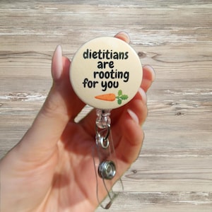 Dietitian Badge Reel – Carrot ‘Rooting for You’ Button – Healthcare ID Clip for RDs 1.25”