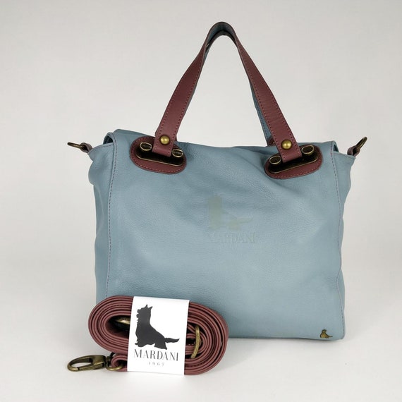 multi compartment leather handbag