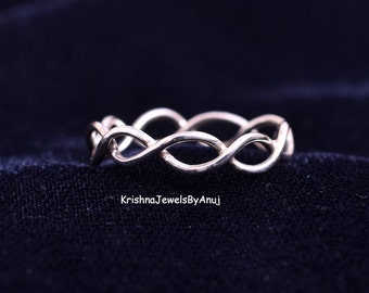 929 Silver multi-arm ring with white topaz and black spinels