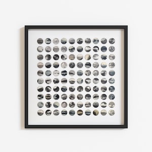 May include: A framed artwork featuring a grid of circular landscape photographs in grayscale. The black frame surrounds a white matting, with each small image showcasing a different natural scene, creating a cohesive collection.