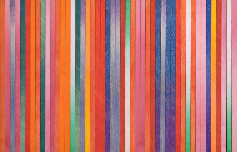 May include: A colorful wooden background with vertical stripes of various colors, including red, orange, yellow, green, blue, purple, and pink.