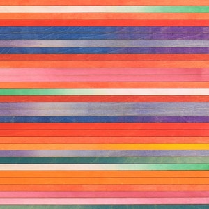 May include: A colorful wooden wall art piece with horizontal stripes in various shades of red, orange, yellow, green, blue, and purple.