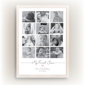 May include: A framed black and white photo collage with twelve baby pictures. The words "My First Year" are written in cursive below the photos, with a pink heart and the baby's name and date.