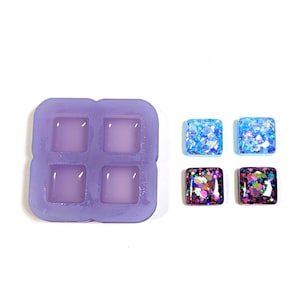 May include: A square, lavender-colored silicone mold with four square cavities, next to four finished resin squares. The resin squares are blue and multi-colored with glitter, suitable for jewelry or craft projects.