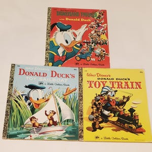 Vintage Little Golden Books Walt Disney - Disneyland Parade with Donald Duck, Donald Duck&#39;s Toy Sailboat, Donald Duck&#39;s Toy Train - Lot of 3