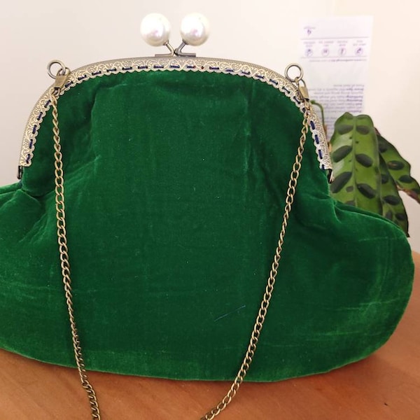 Emerald green velvet clutch