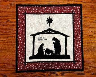 Centro de mesa colgante de pared con natividad acolchada